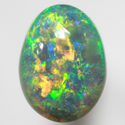 SOLID SEMI BLACK OPAL Very bright orange and green in a 3D pattern SEE VIDEO